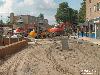 23-08-2006 de stratenmakers zijn hier begonnen met het uitvlakken van de grond en nieuwe putten te plaatsen in het winkelcentrum beverwaard.