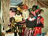 05-12-2006 sinterklaas en zwarte pieten bezoeken de rk regenboogschool grondvelderf beverwaard.